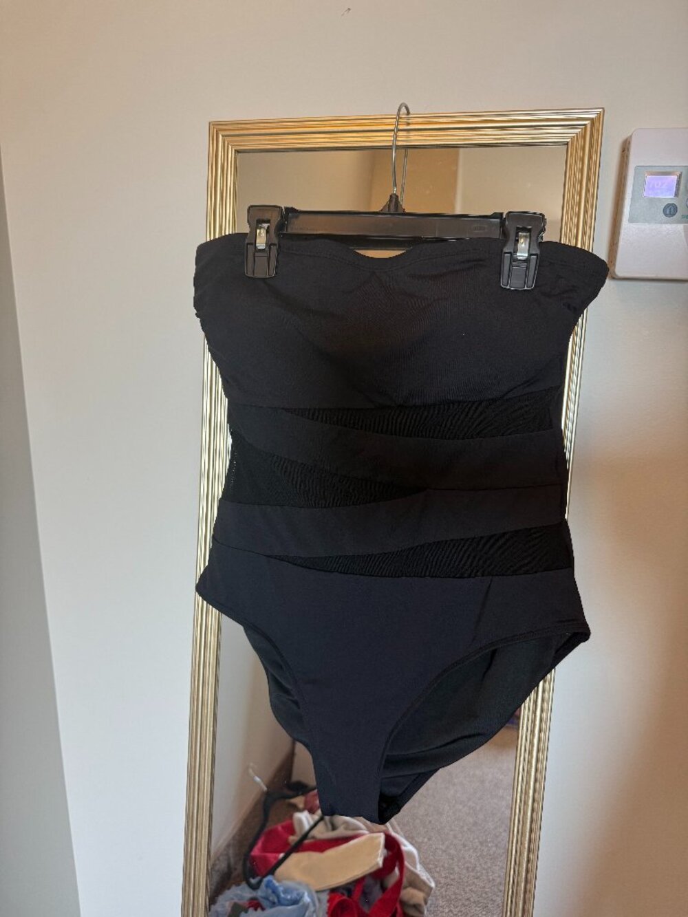 Black one piece bathing suit mesh paneling